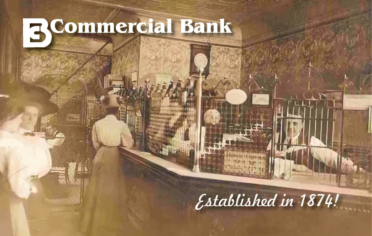 Two women talking while another woman conducts a transaction at a bank back in the 1800s. A bank cashier looks out at customers through the protective bars. 